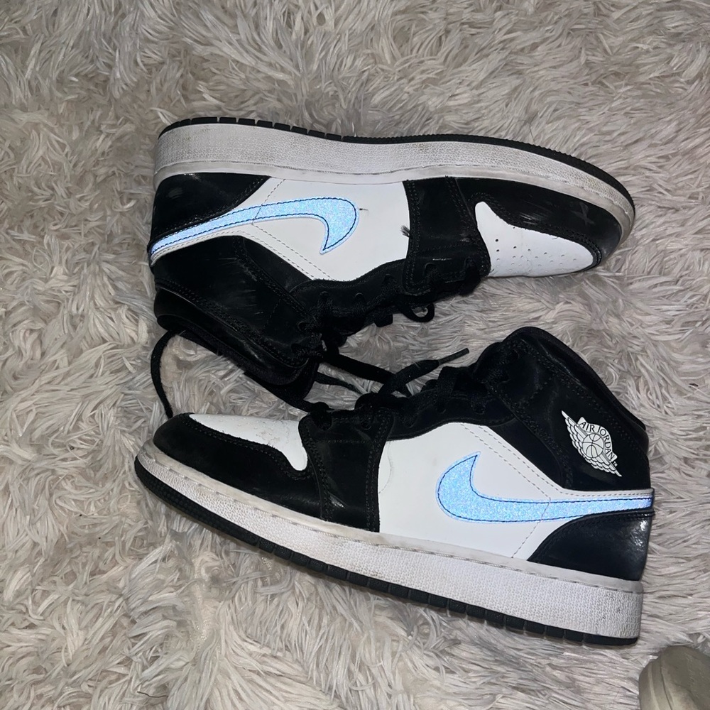 Black and White Sneakers with Blue Accents